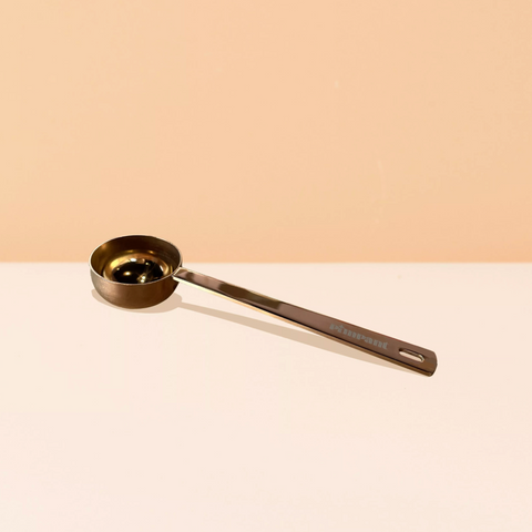 Cuillère doseuse lessive